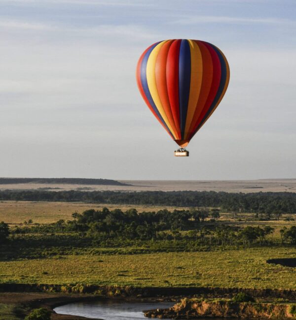 Air balloon floating over Mara River, Kenya